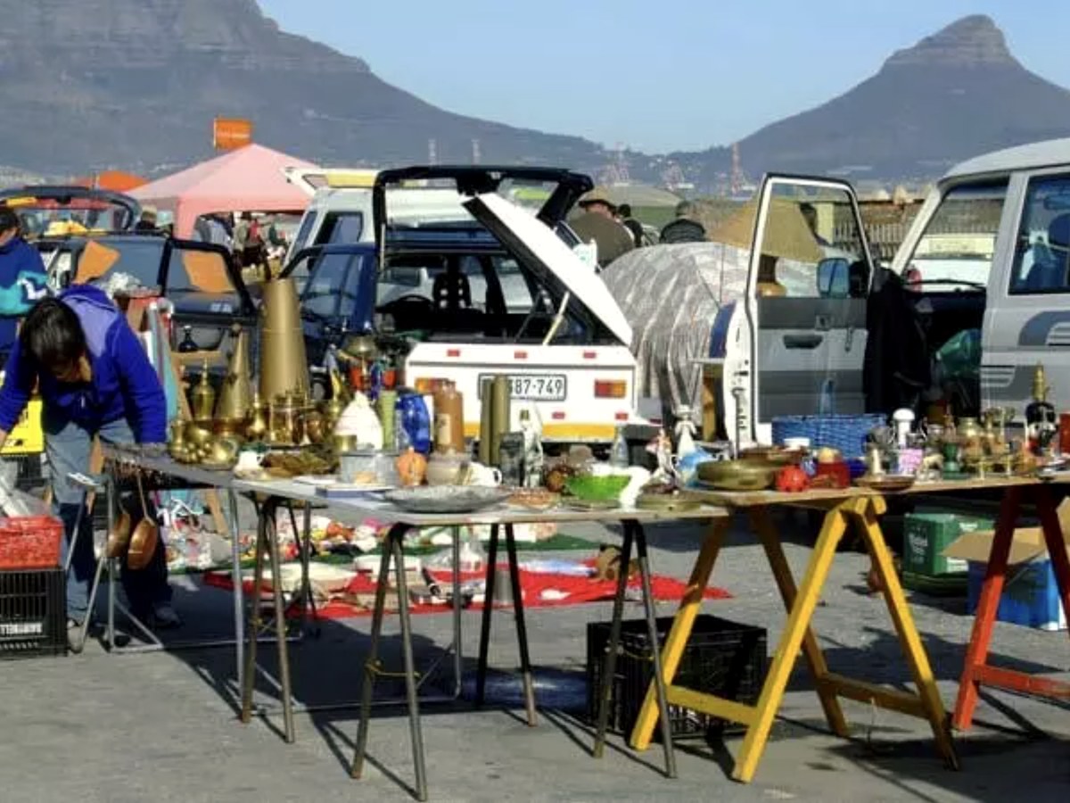 Bric-a-brac stalls at Milnerton Market with Lion's Head behind